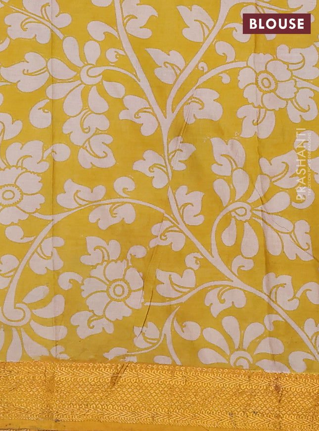 Kalamkari semi silk saree multi colour and mustard yellow with allover prints and zari woven border