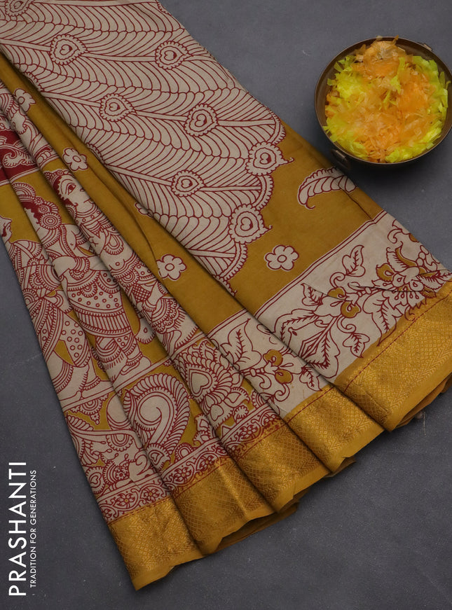 Kalamkari semi silk saree maroon and mustard yellow with allover prints and zari woven border