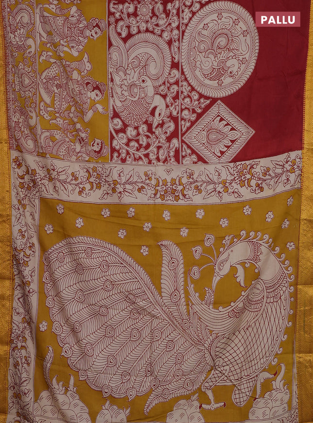 Kalamkari semi silk saree maroon and mustard yellow with allover prints and zari woven border