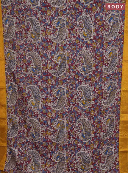 Kalamkari semi silk saree maroon and mustard yellow with allover prints and zari woven border