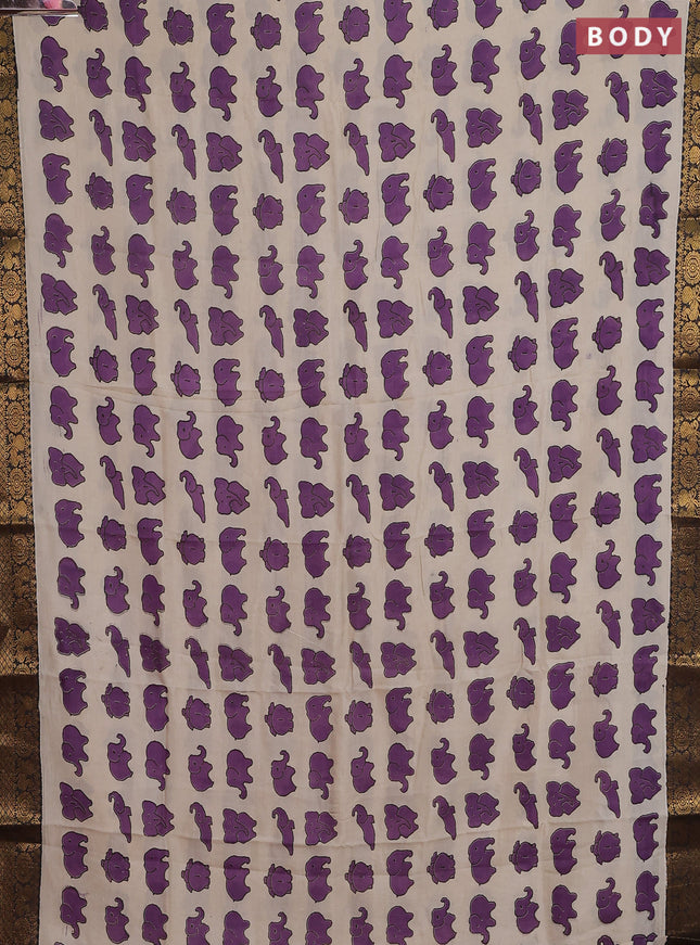Kalamkari semi silk saree beige purple and black with allover elephant butta prints and zari woven border