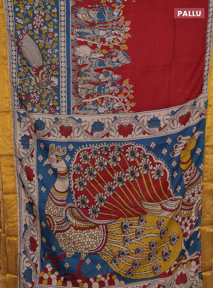 Kalamkari semi silk saree cs blue and mustard yellow with allover prints and zari woven border