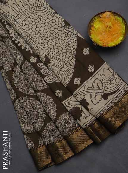 Kalamkari semi silk saree dark olive green and black with allover prints and zari woven border