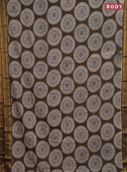 Kalamkari semi silk saree dark olive green and black with allover prints and zari woven border