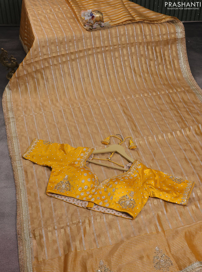 Tissue silk saree mustard yellow and yellow with zari weaves & lace work border