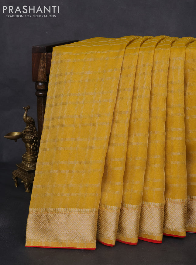 Tissue silk saree yellow and red with zari checked pattern & mirror work buttas