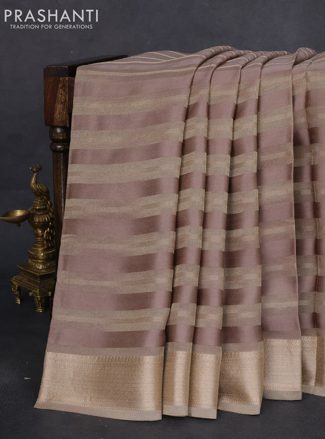 Tissue silk saree chikku shade with allover zari stripe pattern & zari border