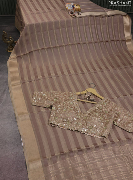 Tissue silk saree chikku shade with allover zari stripe pattern & zari border