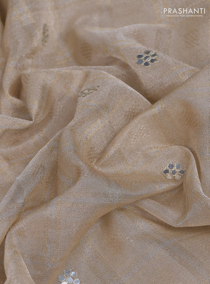 Tissue silk saree beige and black with zari checked pattern & mirror work buttas