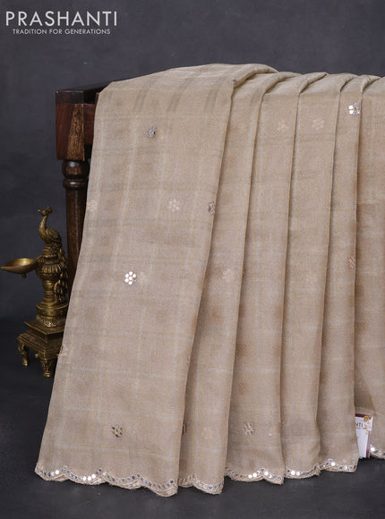 Tissue silk saree beige and black with checked pattern & mirror work pallu