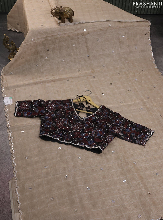 Tissue silk saree beige and black with checked pattern & mirror work pallu