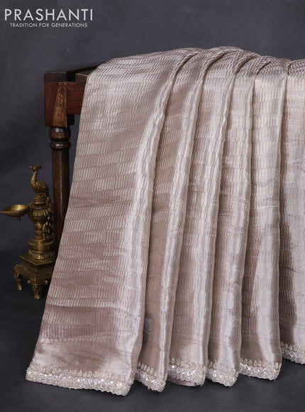 Tissue silk saree pastel pink and violet with silver zari weaves & sequin work border