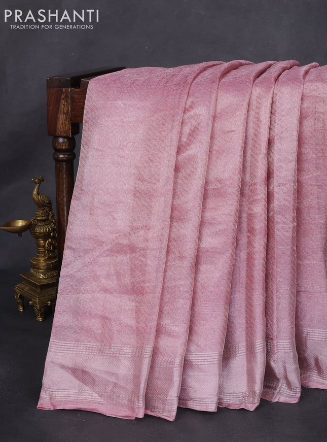 Tissue silk saree peach pink shade and pink with silver zari woven border