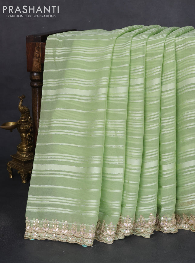 Chiffon silk saree pista green with allover stripe pattern & mirror embroidery pallu