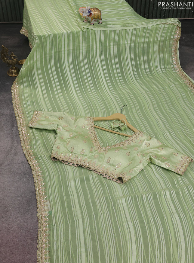 Chiffon silk saree pista green with allover stripe pattern & mirror embroidery pallu
