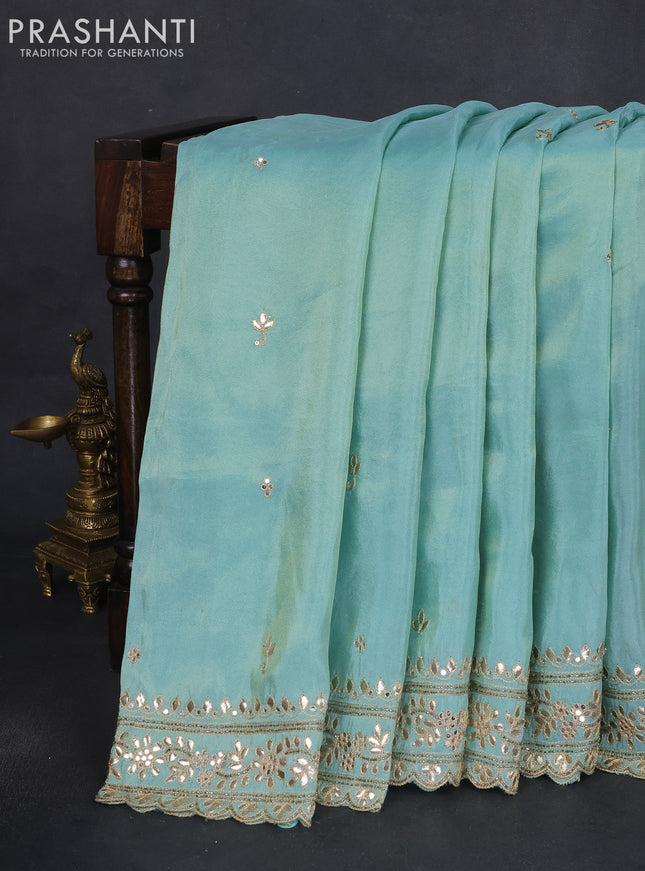 Tissue silk saree teal blue and navy blue with embridery buttas & gotapatti work pallu