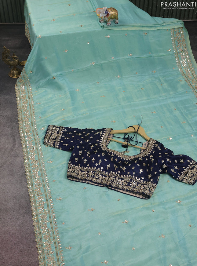 Tissue silk saree teal blue and navy blue with embridery buttas & gotapatti work pallu
