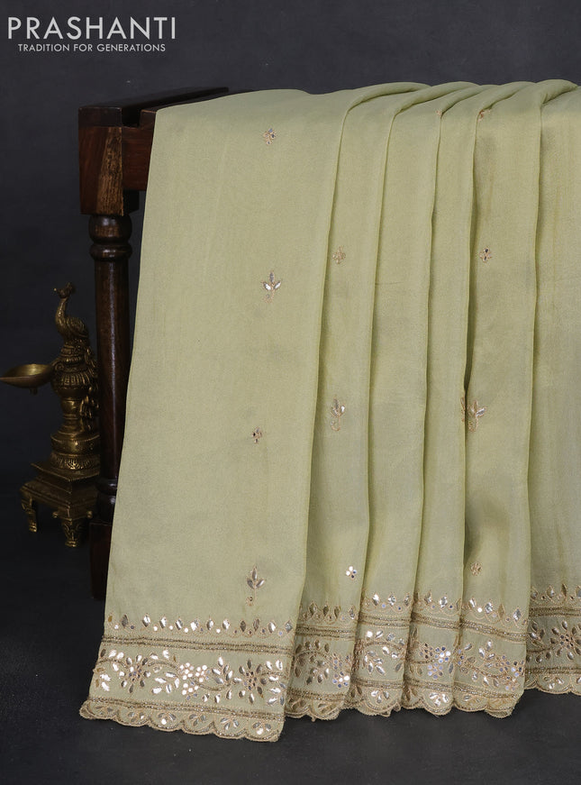 Tissue silk saree pista green and light green with embridery buttas & gotapatti work pallu