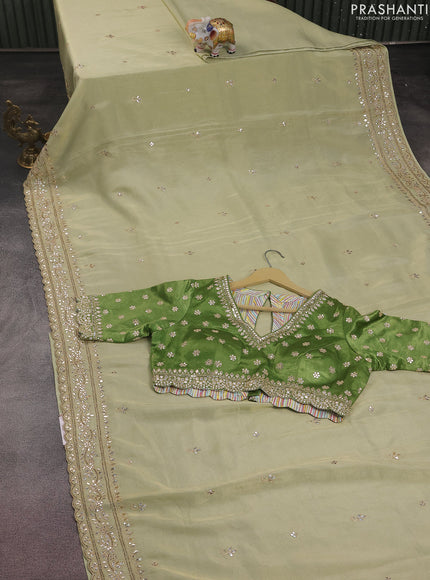 Tissue silk saree pista green and light green with embridery buttas & gotapatti work pallu