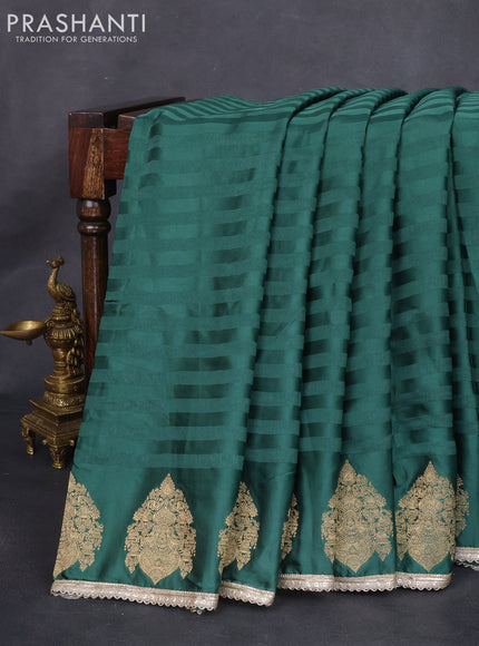 Satin crepe silk saree dark green with allover stripe pattern & mirror work pallu