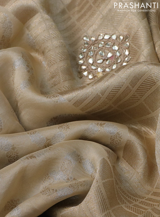 Banarasi silk saree cream with zari buttas & gotapatti work pallu