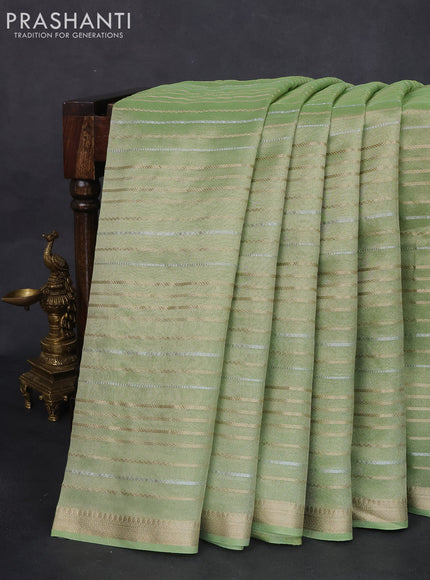 Tissue silk saree pista green with silver & gold zari stripes