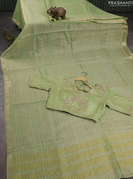 Tissue silk saree pista green with silver & gold zari stripes