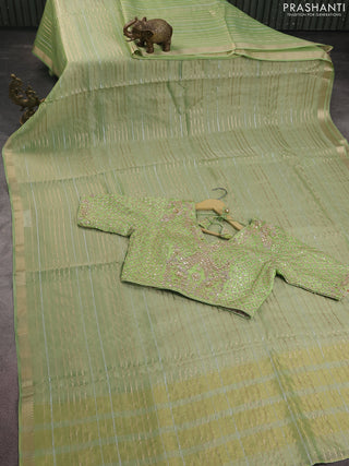 Tissue silk saree pista green with silver & gold zari stripes
