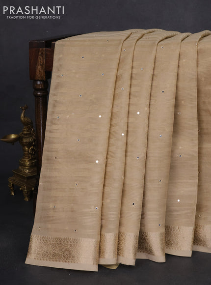 Tissue silk saree beige and maroon with allover stripe pattern & mirror work