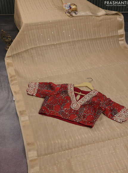 Tissue silk saree beige and maroon with allover stripe pattern & mirror work