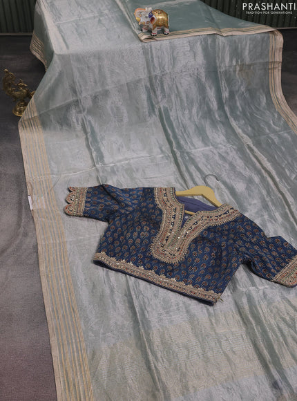Tissue silk saree pastel grey and blue with plain body & zari woven border