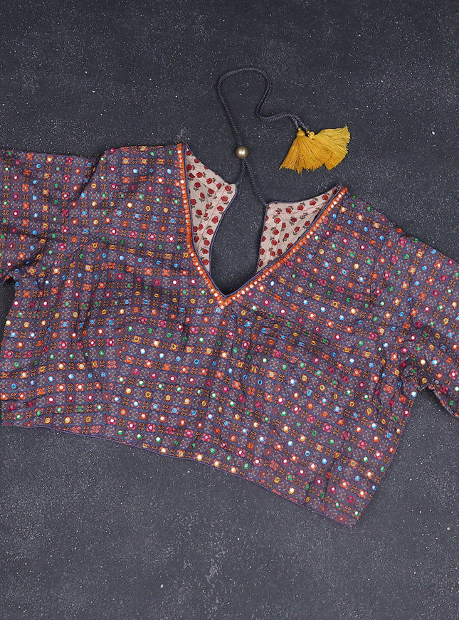 Crepe silk saree off white black and pastel violet with patola prints & embroidery mirror work pallu