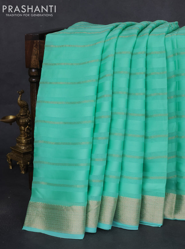 Organza silk saree teal green shade with zari stripes & gotapatti work pallu
