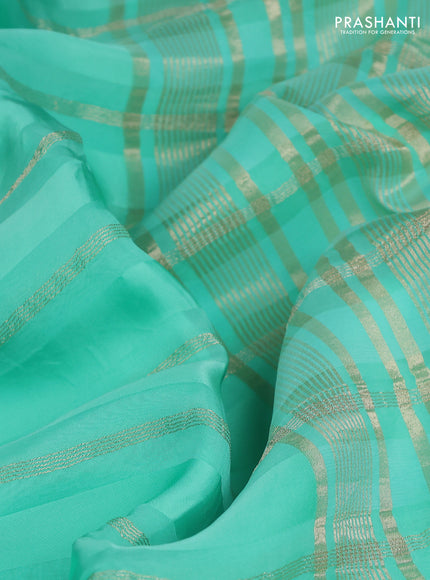 Organza silk saree teal green shade with zari stripes & gotapatti work pallu