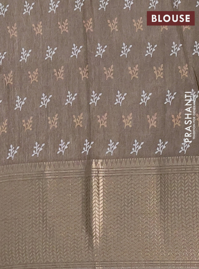 Semi dola saree grey shade with batik butta prints and zari woven border