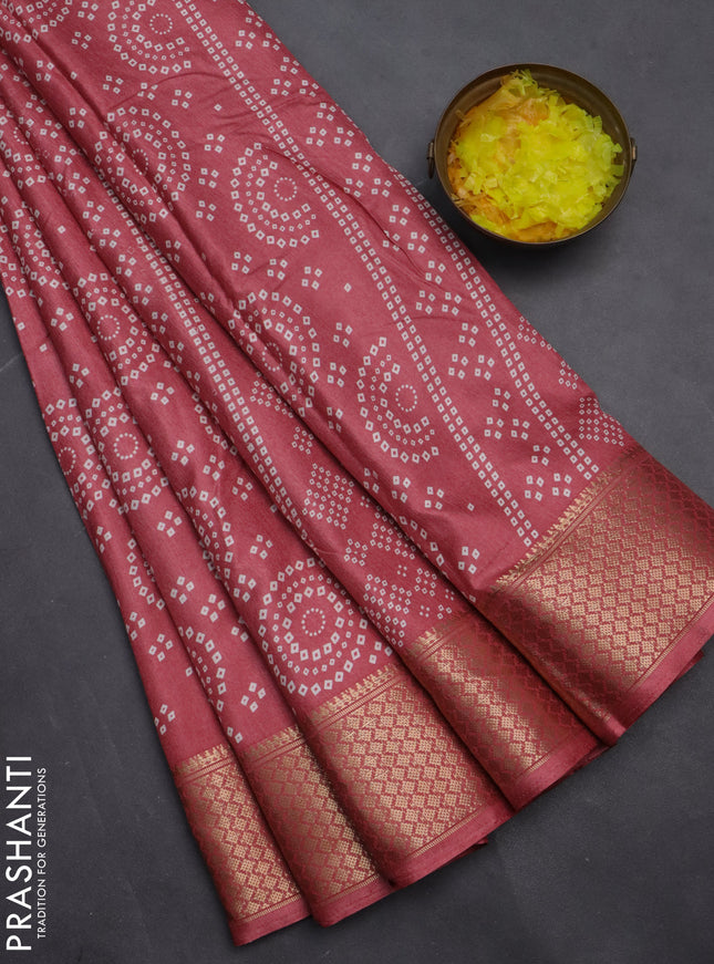 Semi dola saree dark peach with allover bandhani prints and zari woven border