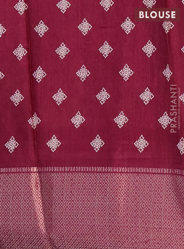 Semi dola saree wine shade with allover floral ikat prints and zari woven border