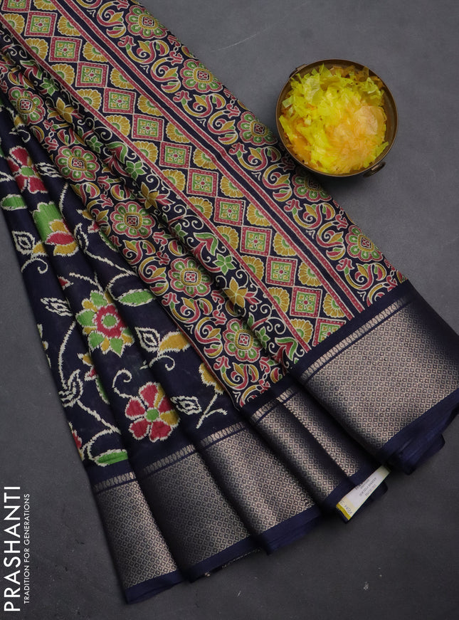 Semi dola saree navy blue with allover floral ikat prints and zari woven border