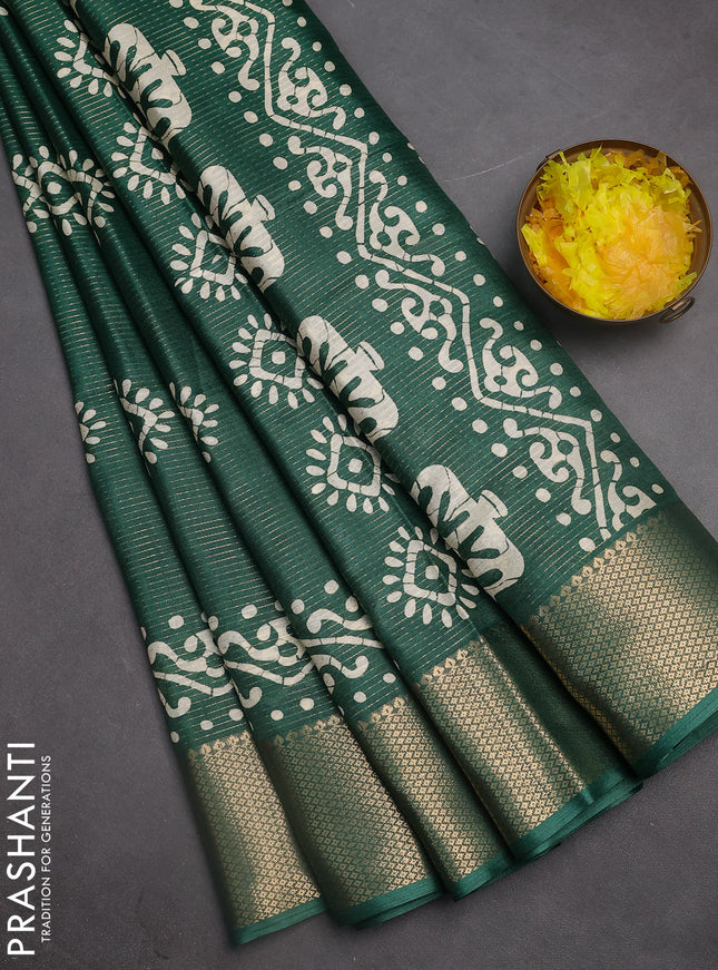 Semi dola saree dark green with allover zari weaves & batik butta prints and zari woven border
