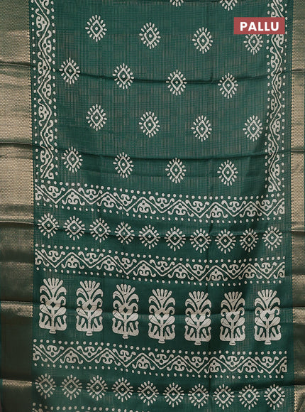 Semi dola saree dark green with allover zari weaves & batik butta prints and zari woven border