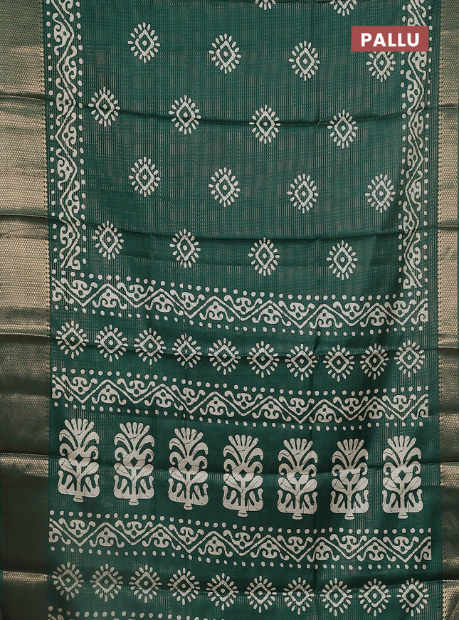Semi dola saree dark green with allover zari weaves & batik butta prints and zari woven border