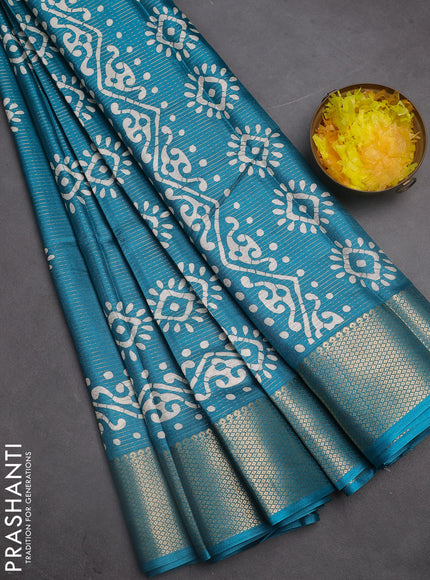 Semi dola saree teal green shade with allover zari weaves & batik butta prints and zari woven border