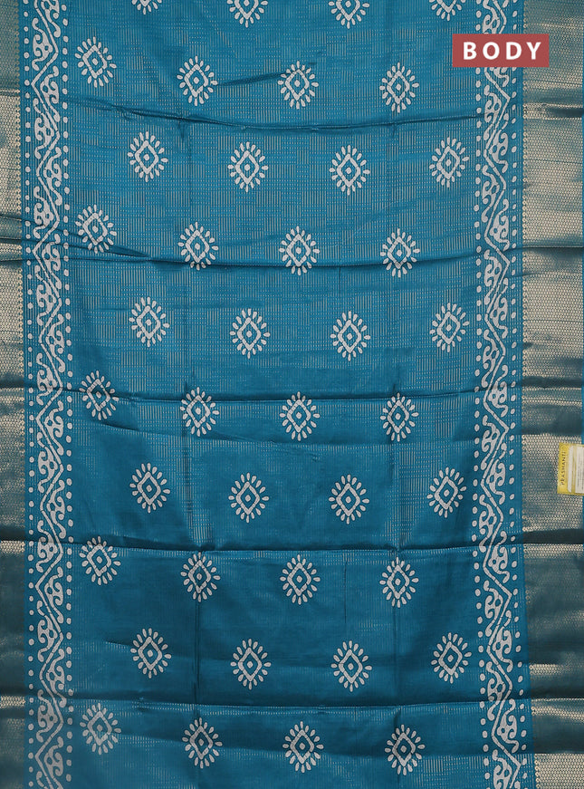 Semi dola saree teal green shade with allover zari weaves & batik butta prints and zari woven border