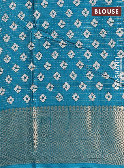 Semi dola saree teal green shade with allover zari weaves & batik butta prints and zari woven border