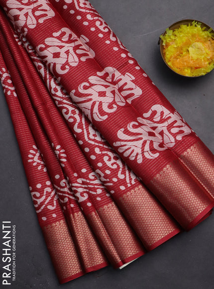 Semi dola saree maroon with allover zari weaves & batik butta prints and zari woven border