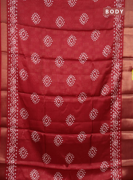Semi dola saree maroon with allover zari weaves & batik butta prints and zari woven border