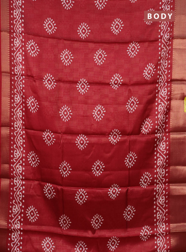 Semi dola saree maroon with allover zari weaves & batik butta prints and zari woven border