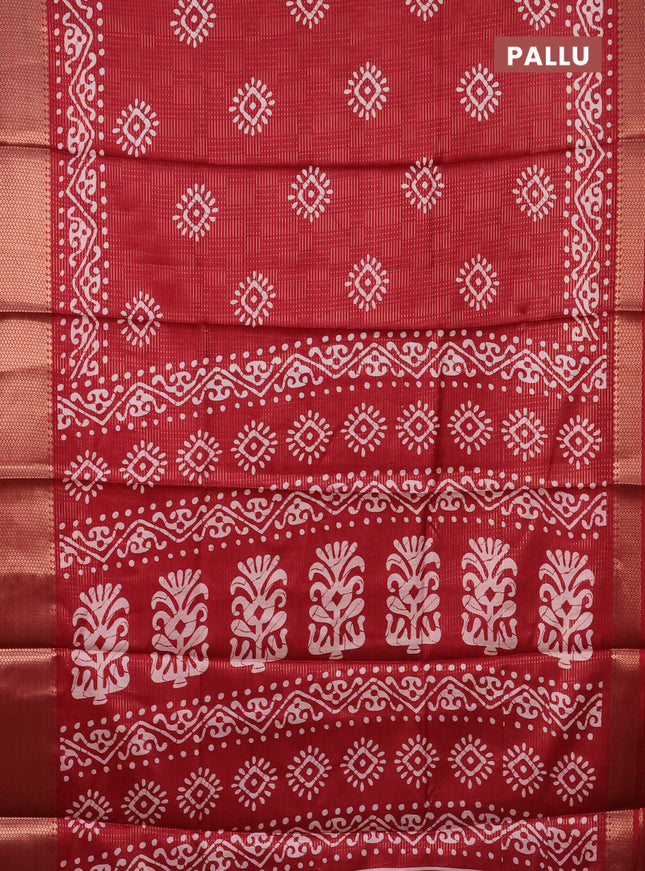 Semi dola saree maroon with allover zari weaves & batik butta prints and zari woven border