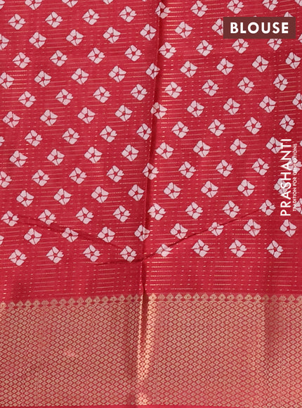 Semi dola saree maroon with allover zari weaves & batik butta prints and zari woven border