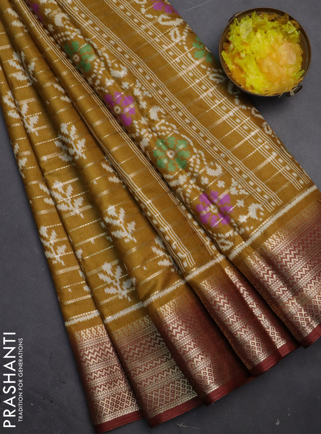 Semi dola saree dark mustard and brown with allover zari weaves & ikat buttas and zari woven border